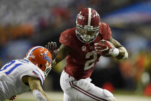 Dec 5, 2015; Atlanta, GA, USA; Alabama Crimson Tide running back Derrick Henry (2) runs against Florida Gators defensive back Jalen Tabor (31) during the third quarter of the 2015 SEC Championship Game at the Georgia Dome. Mandatory Credit: John David Mercer-USA TODAY Sports Dec 5, 2015; Atlanta, GA, USA; Alabama Crimson Tide running back Derrick Henry (2) runs against Florida Gators defensive back Jalen Tabor (31) during the third quarter of the 2015 SEC Championship Game at the Georgia Dome. Mandatory Credit: John David Mercer-USA TODAY Sports