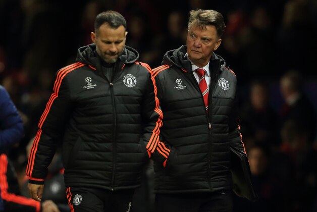 MANCHESTER, ENGLAND - NOVEMBER 25:  A dejected Ryan Giggs and Louis van Gaal the head coach / manager of Manchester United after the UEFA Champions League match between Manchester United FC and PSV Eindhoven at Old Trafford on November 25, 2015 in Manchester, United Kingdom.  (Photo by Matthew Ashton - AMA/Getty Images)