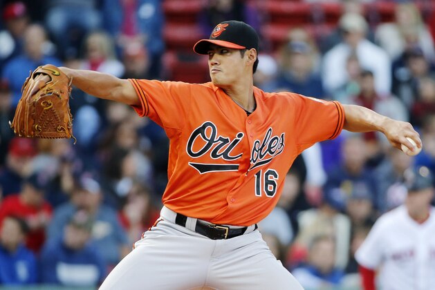 Baltimore Orioles' Wei-Yin Chen pitches during the first inning of a baseball game against the Boston Red Sox in Boston, Saturday, Sept. 26, 2015. (AP Photo/Michael Dwyer)