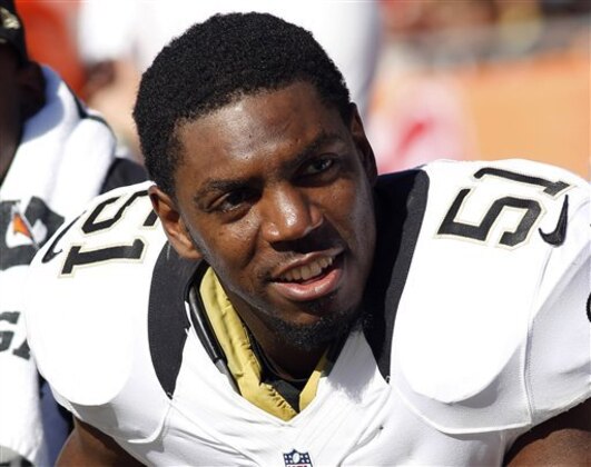 FILE - This Oct. 21, 2012 file photo shows New Orleans Saints linebacker Jonathan Vilma on the bench at an NFL game against the Tampa Bay Buccaneers in Tampa, Florida. More than nine months after the NFL first disclosed its bounty investigation of the New Orleans Saints, four players will finally get a ruling on whether their initial suspensions are upheld, reduced or thrown out. (AP Photo/Scott Iskowitz, File)