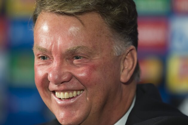 Manchester United's manager Louis van Gaal smiles as he speaks during a press conference at Old Trafford Stadium, Manchester, England, Tuesday, Sept. 29, 2015. Manchester United will play VFL Wolfsberg in a Champions League group B soccer match on Wednesday.  (AP Photo/Jon Super)