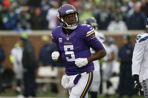 Minnesota Vikings quarterback Teddy Bridgewater (5) looks to the replay as he runs off the field against the Seattle Seahawks in the first half of an NFL football game Sunday, Dec. 6, 2015 in Minneapolis. (AP Photo/Ann Heisenfelt)