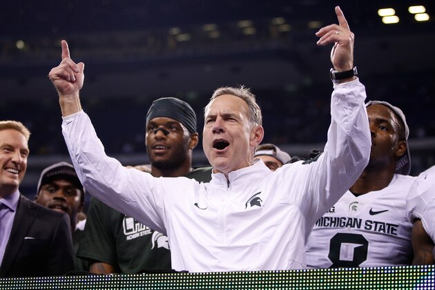 INDIANAPOLIS, IN - DECEMBER 05:  Head coach Mark Dantonio of the Michigan State Spartans celebrates after beating the Iowa Hawkeyes in the Big Ten Championship at Lucas Oil Stadium on December 5, 2015 in Indianapolis, Indiana.  (Photo by Joe Robbins/Getty Images)