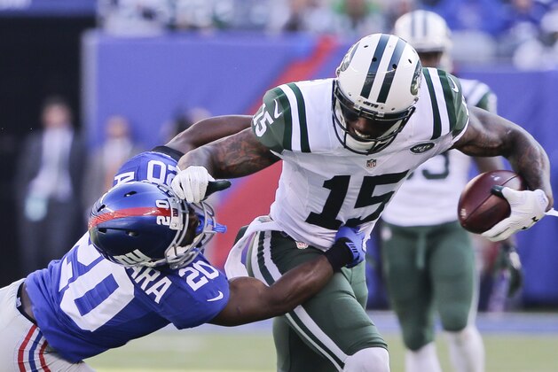 New York Jets wide receiver Brandon Marshall (15) stiff-arms New York Giants' Prince Amukamara during the first half of an NFL football game Sunday, Dec. 6, 2015, in East Rutherford, N.J. (AP Photo/Julie Jacobson) New York Jets wide receiver Brandon Marshall (15) stiff-arms New York Giants' Prince Amukamara during the first half of an NFL football game Sunday, Dec. 6, 2015, in East Rutherford, N.J. (AP Photo/Julie Jacobson)