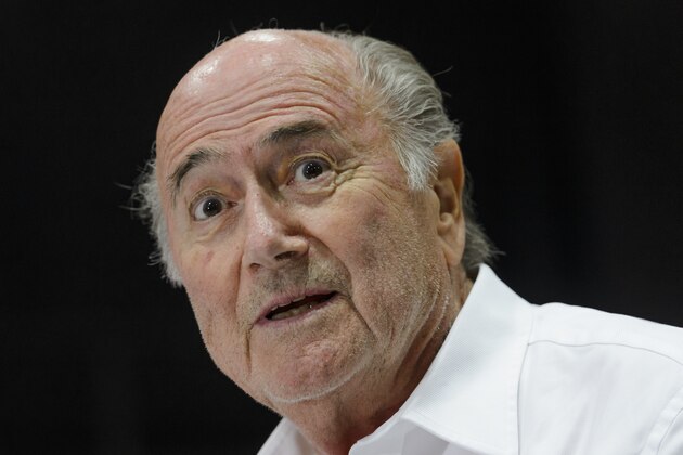 Outgoing FIFA president Sepp Blatter answers to a press conference during the 'Sepp Blatter Tournament' on August 22, 2015 in Ulrichen, Blatter's hometown. When Blatter was elected FIFA President in 1998, the town awarded him with the 'honorary burgher' of Ulrichen title and to commemorate the occasion, a football tournament bearing his name was created.  AFP PHOTO / FABRICE COFFRINI        (Photo credit should read FABRICE COFFRINI/AFP/Getty Images)