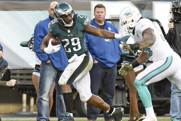 Nov 15, 2015; Philadelphia, PA, USA; Philadelphia Eagles running back DeMarco Murray (29) pushes away Miami Dolphins outside linebacker Koa Misi (55) during the fourth quarter at Lincoln Financial Field. The Dolphins won 20-19. Mandatory Credit: Eric Hartline-USA TODAY Sports