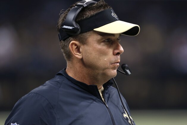 New Orleans Saints head coach Sean Payton watches in the first half of an NFL football game against the Carolina Panthers in New Orleans, Sunday, Dec. 6, 2015. (AP Photo/Jonathan Bachman)