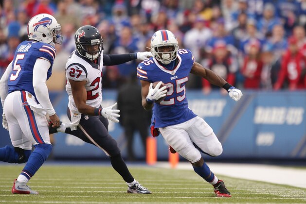 ORCHARD PARK, NY - DECEMBER 06:  LeSean McCoy #25 of the Buffalo Bills runs the ball past Quintin Demps #27 of the Houston Texans during the second half at Ralph Wilson Stadium on December 6, 2015 in Orchard Park, New York.  (Photo by Brett Carlsen/Getty Images)