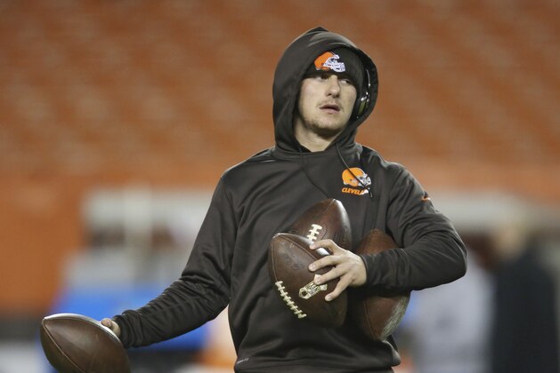 Cleveland Browns quarterback Johnny Manziel warms up before an NFL football game between the Baltimore Ravens and the Cleveland Browns, Monday, Nov. 30, 2015, in Cleveland. (AP Photo/Ron Schwane)