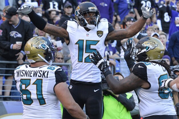 Nov 15, 2015; Baltimore, MD, USA; Jacksonville Jaguars wide receiver Allen Robinson (15) celebrates with teammates after catching a touchdown pass during the fourth quarter against the Baltimore Ravens at M&T Bank Stadium. Mandatory Credit: Tommy Gilligan-USA TODAY Sports