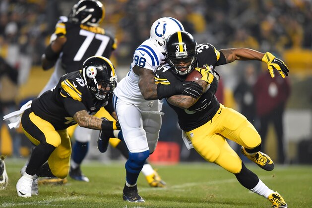PITTSBURGH, PA - DECEMBER 6:  DeAngelo Williams #34 of the Pittsburgh Steelers carries the ball while Robert Mathis #98 of the Indianapolis Colts defends during the game at Heinz Field on December 6, 2015 in Pittsburgh, Pennsylvania. (Photo by Joe Sargent/Getty Images)