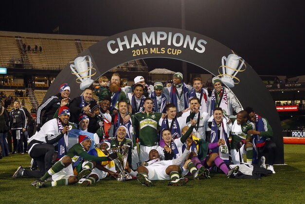 Dec 6, 2015; Columbus, OH, USA; Portland Timbers players pose for a team photo with the MLS Cup after defeating the Columbus Crew in the 2015 MLS Cup championship game at MAPFRE Stadium. Mandatory Credit: Geoff Burke-USA TODAY Sports