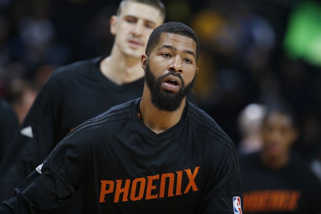 Phoenix Suns forward Markieff Morris (11) in the first half of an NBA basketball game Friday, Nov. 20, 2015, in Denver. (AP Photo/David Zalubowski)