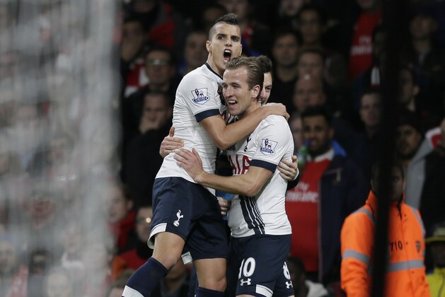 Tottenham’s Harry Kane, right, celebrates after scoring a goal, with Tottenham’s Erik Lamela during the English Premier League soccer match between Arsenal and Tottenham Hotspur at the Emirates Stadium in London, Sunday Nov. 8, 2015. (AP Photo/Tim Ireland)