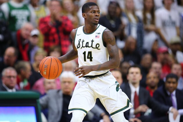 EAST LANSING, MI - DECEMBER 2: Eron Harris #14 of the Michigan State Spartans dribbles the ball during the game against the Louisville Cardinals in the first half at the Breslin Center on December 2, 2015 in East Lansing, Michigan. (Photo by Rey Del Rio/Getty Images)
