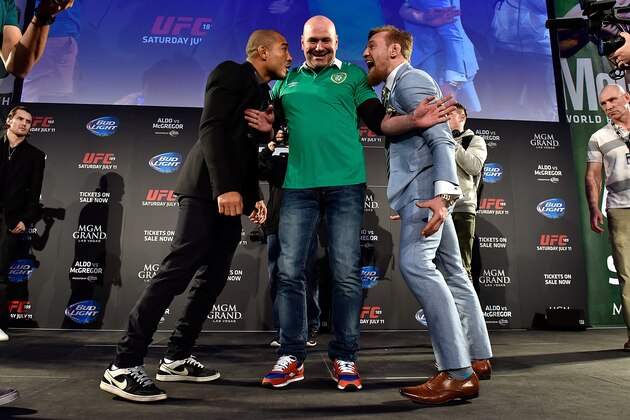 DUBLIN, IRELAND - MARCH 31:  UFC President Dana White (C) separates UFC Featherweight Champion Jose Aldo of Brazil (L) and title challenger Conor 'The Notorious' McGregor of Ireland (R) as they face off during the UFC 189 World Championship Fan Event on March 31, 2015 in Dublin, Ireland. (Photo by Jeff Bottari/Zuffa LLC/Zuffa LLC via Getty Images)