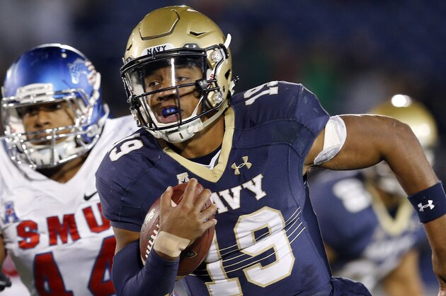 Navy quarterback Keenan Reynolds (19) rushes the ball for a touchdown past SMU linebacker Jackson Mitchell in the second half of an NCAA college football game Saturday, Nov. 14, 2015, in Annapolis, Md. Navy won 55-14. (AP Photo/Patrick Semansky)