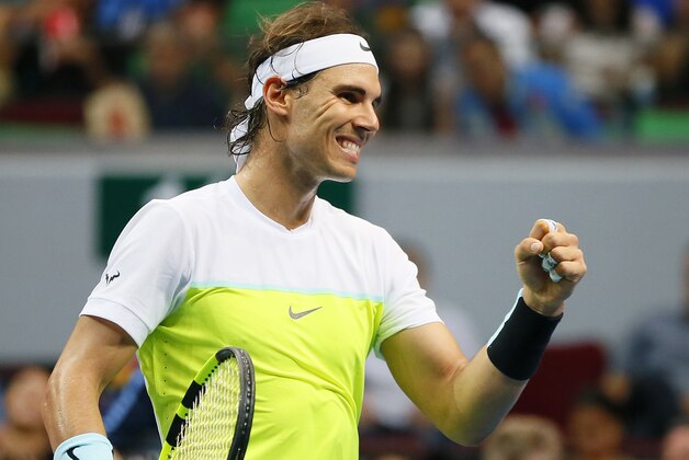 Spain's Rafael Nadal of the Indian Aces celebrates after getting a point against Czech Republic’s Tomas Berdych of the UAE Royals during their men's singles match in the International Premier Tennis League Monday, Dec. 7, 2015 at the Mall of Asia Arena in Pasay city, south of Manila, Philippines. Nadal won 6-5. (AP Photo/Bullit Marquez)