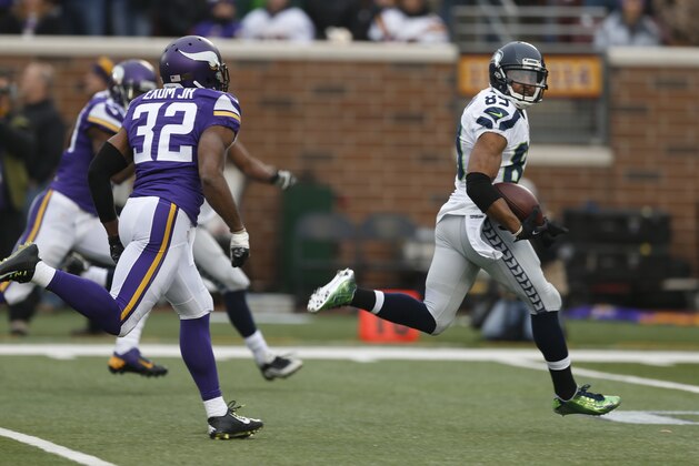 Seattle Seahawks wide receiver Doug Baldwin (89) looks back on a 53-yard touchdown reception against the Minnesota Vikings in the second half of an NFL football game Sunday, Dec. 6, 2015 in Minneapolis. (AP Photo/Jim Mone)