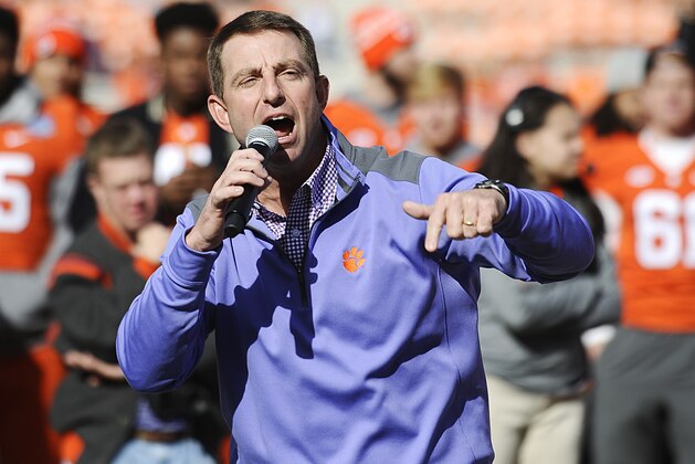 Clemson head coach Dabo Swinney speaks to the crowd during a pizza party celebrating Selection Sunday at Memorial Stadium, Sunday, Dec. 6, 2015, in Clemson, S.C. (AP Photo/Rainier Ehrhardt)
