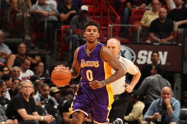 MIAMI, FL - NOVEMBER 10:  Nick Young #0 of the Los Angeles Lakers brings the ball up court against the Miami Heat on November 10, 2015 at AmericanAirlines Arena in Miami, Florida. NOTE TO USER: User expressly acknowledges and agrees that, by downloading and or using this Photograph, user is consenting to the terms and conditions of the Getty Images License Agreement. Mandatory Copyright Notice: Copyright 2015 NBAE (Photo by Issac Baldizon/NBAE via Getty Images)