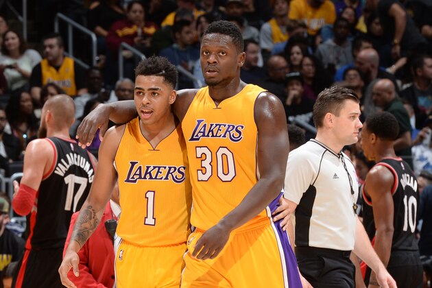 LOS ANGELES, CA - NOVEMBER 20:  Julius Randle #30 of the Los Angeles Lakers and D'Angelo Russell #1 of the Los Angeles Lakers talk during the game against the Toronto Raptors on November 20, 2015 at STAPLES Center in Los Angeles, California. NOTE TO USER: User expressly acknowledges and agrees that, by downloading and/or using this Photograph, user is consenting to the terms and conditions of the Getty Images License Agreement. Mandatory Copyright Notice: Copyright 2015 NBAE (Photo by Andrew D. Bernstein/NBAE via Getty Images)