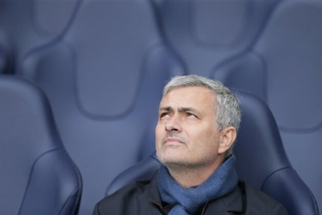 Chelsea Manager Jose Mourinho looks across the pitch before the English Premier League soccer match between Tottenham Hotspur and Chelsea at White Hart Lane in London, Sunday Nov. 29, 2015. (AP Photo/Tim Ireland)