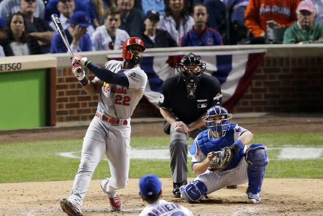 St. Louis Cardinals' Jason Heyward (22) hits a home run against the Chicago Cubs during the sixth inning of Game 3 in baseball's National League Division Series, Monday, Oct. 12, 2015, in Chicago. (AP Photo/Charles Rex Arbogast)