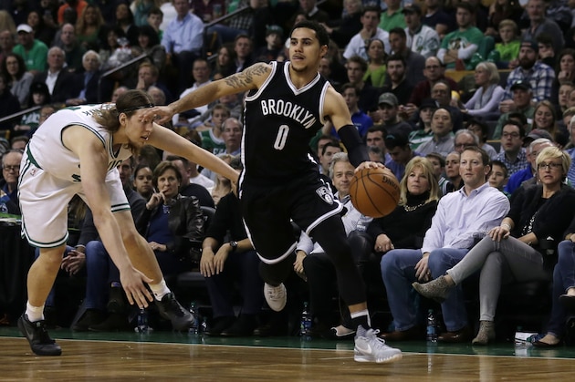 Brooklyn Nets guard Shane Larkin (0) drives to the basket during the second half of an NBA basketball game in Boston Friday, Nov. 20, 2015. (AP Photo/Charles Krupa)