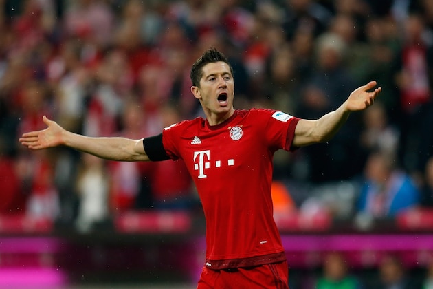 MUNICH, GERMANY - SEPTEMBER 22:  Robert Lewandowski of Muenchen celebrates his team's first goal during the Bundesliga match between FC Bayern Muenchen and VfL Wolfsburg at Allianz Arena on September 22, 2015 in Munich, Germany.  (Photo by Boris Streubel/Getty Images)