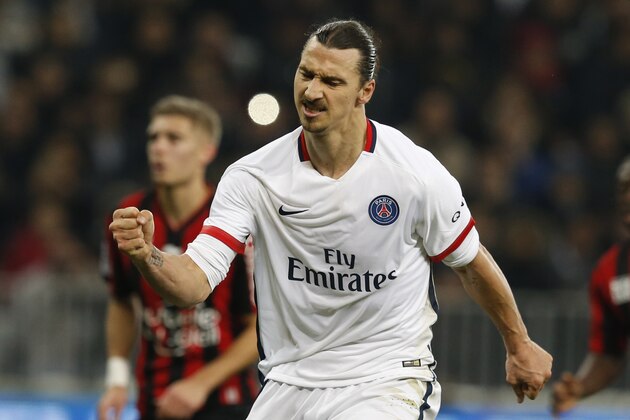 Paris Saint-Germain's Swedish forward Zlatan Ibrahimovic celebrates after scoring a penalty during the French L1 football match Nice (OGC Nice) vs Paris Saint-Germain (PSG) on December 4, 2015 at the 'Allianz Riviera' stadium in Nice, southeastern France.  AFP PHOTO / VALERY HACHE / AFP / VALERY HACHE        (Photo credit should read VALERY HACHE/AFP/Getty Images)