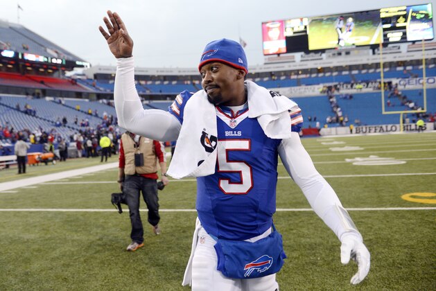 Buffalo Bills quarterback Tyrod Taylor gestures while walking off the field after an NFL football game against the Houston Texans, Sunday, Dec. 6, 2015, in Orchard Park, N.Y. The Bills won 30-21. (AP Photo/Gary Wiepert)