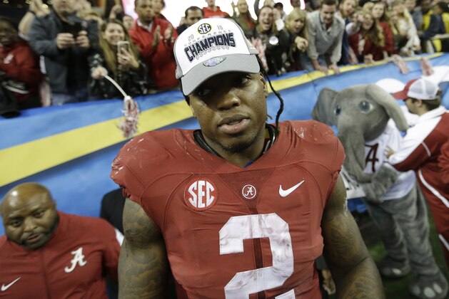 Alabama running back Derrick Henry (2) leaves the field after the second half of the Southeastern Conference championship NCAA college football game against Florida, Saturday, Dec. 5, 2015, in Atlanta. Alabama won 29-15. (AP Photo/David Goldman)