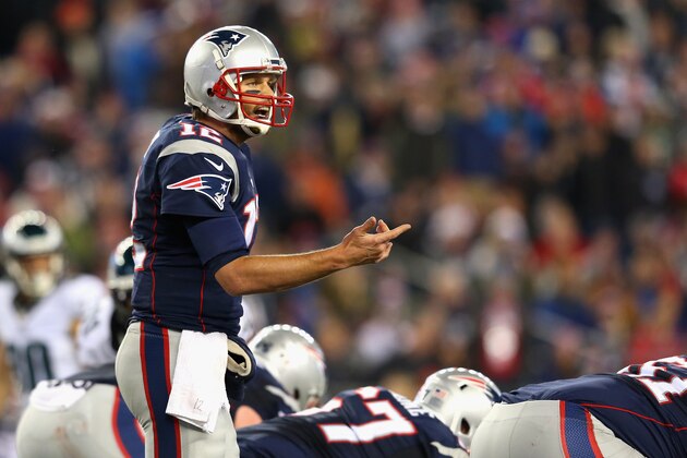 FOXBORO, MA - DECEMBER 06:  Tom Brady #12 of the New England Patriots communicates at the line of scrimmage during the game against the Philadelphia Eagles at Gillette Stadium on December 6, 2015 in Foxboro, Massachusetts.  (Photo by Jim Rogash/Getty Images)