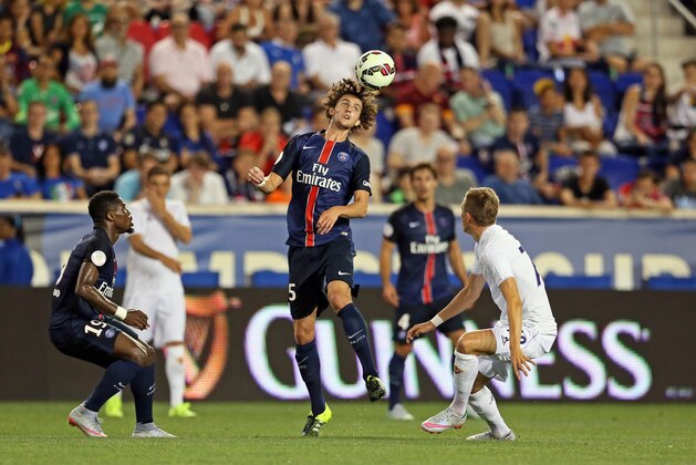 IMAGE DISTRIBUTED FOR INTERNATIONAL CHAMPIONS CUP - Paris Saint-Germain midfielder Adrien Rabiot (25) heads the ball over Fiorentina midfielder Josip Ilicic (72) at the International Champions Cup, on Tuesday, July 21, 2015 in Harrison, New Jersey. (Damian Strohmeyer/AP Images for International Champions Cup)
