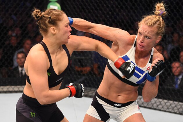 MELBOURNE, AUSTRALIA - NOVEMBER 15:  (R-L) Holly Holm of the United States punches Ronda Rousey of the United States in their UFC women's bantamweight championship bout during the UFC 193 event at Etihad Stadium on November 15, 2015 in Melbourne, Australia. (Photo by Josh Hedges/Zuffa LLC/Zuffa LLC via Getty Images)