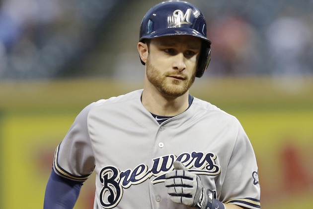 Milwaukee Brewers' Jonathan Lucroy runs the bases after hitting a solo home run off Cleveland Indians starting pitcher Josh Tomlin in the first inning of a baseball game, Tuesday, Aug. 25, 2015, in Cleveland. (AP Photo/Tony Dejak)