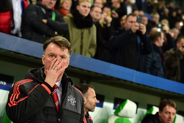 Manchester United's Dutch manager Louis van Gaal is pictured during the UEFA Champions League Group B second-leg football match VfL Wolfsburg vs Manchester United in Wolfsburg, central Germany, on December 8, 2015. AFP PHOTO / JOHN MACDOUGALL / AFP / JOHN MACDOUGALL        (Photo credit should read JOHN MACDOUGALL/AFP/Getty Images)