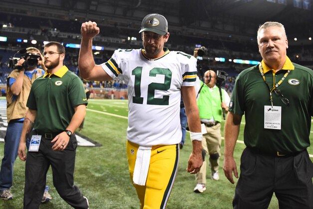 Dec 3, 2015; Detroit, MI, USA; Green Bay Packers quarterback Aaron Rodgers (12) celebrates after defeating the Detroit Lions at Ford Field. Green Bay won 27-23. Mandatory Credit: Tim Fuller-USA TODAY Sports