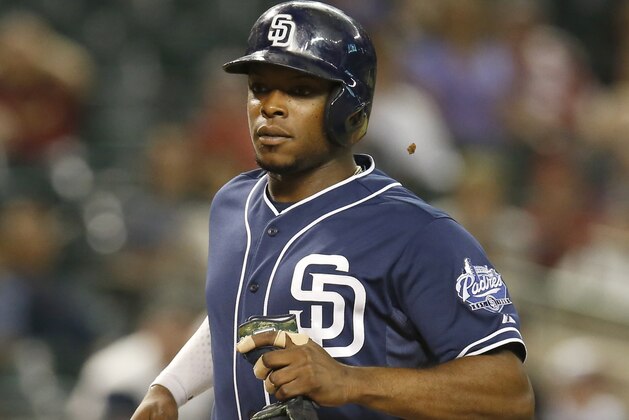 San Diego Padres left fielder Justin Upton (10) in the eighth inning during a baseball game against the Arizona Diamondbacks, Tuesday, Sept. 15, 2015, in Phoenix. (AP Photo/Rick Scuteri)