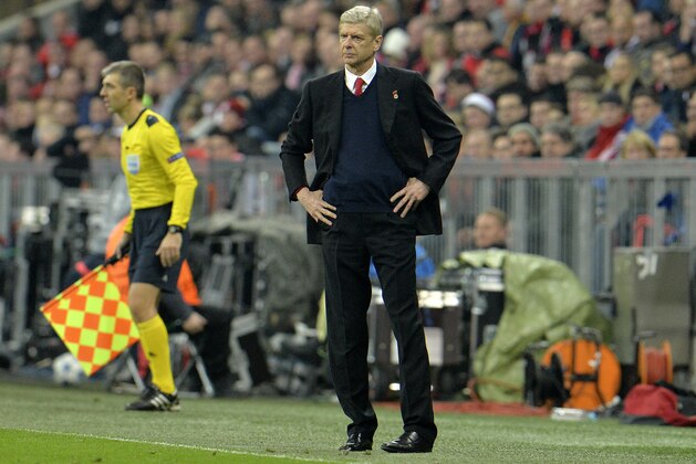 Arsenal manager Arsene Wenger stands in his coaching zone disappointed during the Champions League Group F soccer match between Bayern Munich and Arsenal FC in Munich, southern Germany, Wednesday, Nov. 4, 2015. (AP Photo/Kerstin Joensson)