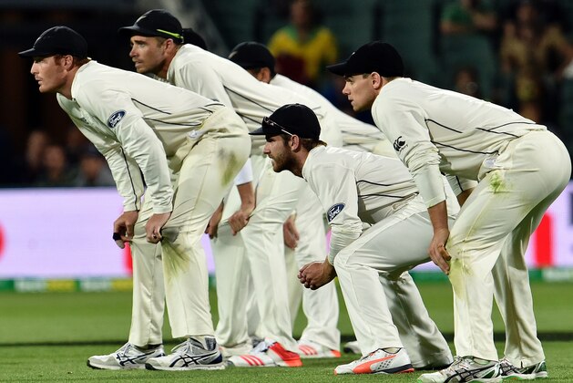 New Zealand players, (R-L) Tom Latham, Kane Williamson, Martin Guptill and Tim Southee, get ready to field in the slip positions against Australia during the first day-night cricket Test match at the Adelaide Oval on November 29, 2015. AFP PHOTO / SAEED KHAN
IMAGE RESTRICTED TO EDITORIAL USE - NO COMMERCIAL USE / AFP / SAEED KHAN        (Photo credit should read SAEED KHAN/AFP/Getty Images)