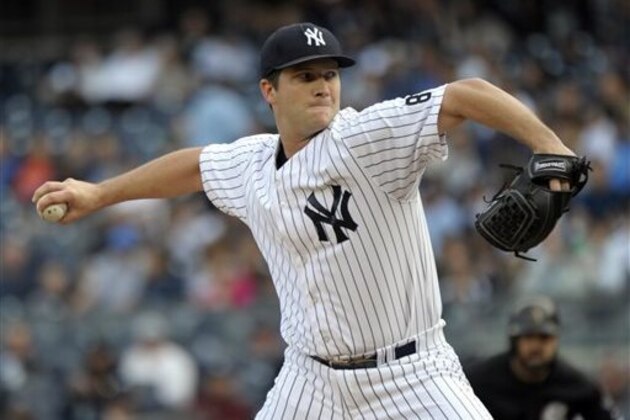 FILE - In this Sept. 26, 2015, file photo, New York Yankees pitcher Adam Warren delivers against the Chicago White Sox during the first inning of a baseball game at Yankee Stadium in New York. The Yankees traded Warren, and a player to be named later, to the Chicago Cubs in exchange for infielder Starlin Castro, the Yankees announced Tuesday, Dec. 8, 2015. (AP Photo/Bill Kostroun, File)