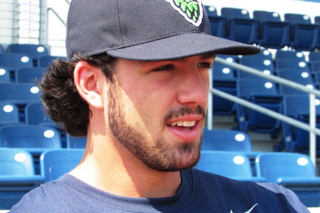 Dansby Swanson, the top pick in this year’s baseball draft by the Arizona Diamondbacks, speaks before a game in Hillsboro, Ore., Thursday, Aug. 13, 2015. Swanson is playing for Arizona’s affiliate, the Hillsboro Hops, after recovering from taking a pitch to the face in a simulated game last month. (AP Photo/Anne M. Peterson)