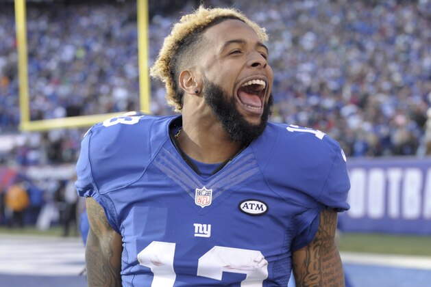 New York Giants wide receiver Odell Beckham (13) celebrates after scoring a touchdown during the first half of an NFL football game against the New York Jets Sunday, Dec. 6, 2015, in East Rutherford, N.J. (AP Photo/Bill Kostroun)