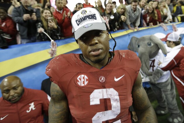 Alabama running back Derrick Henry (2) leaves the field after the second half of the Southeastern Conference championship NCAA college football game against Florida, Saturday, Dec. 5, 2015, in Atlanta. Alabama won 29-15. (AP Photo/David Goldman)