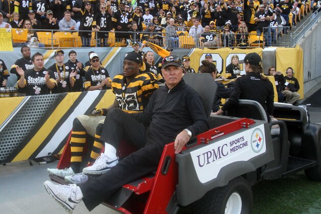 Nov 1, 2015; Pittsburgh, PA, USA; Pittsburgh Steelers running back Le'Veon Bell (26) is carted off of the field after being injured against the Cincinnati Bengals during the first half at Heinz Field. Mandatory Credit: Jason Bridge-USA TODAY Sports