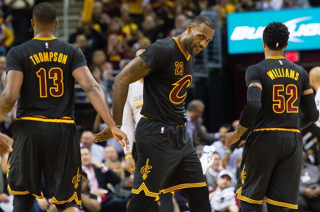 CLEVELAND, OH - DECEMBER 8: Tristan Thompson #13, LeBron James #23 and Mo Williams #52 of the Cleveland Cavaliers celebrate after scoring during the second half at Quicken Loans Arena on December 8, 2015 in Cleveland, Ohio. The Cavaliers defeated the Trail Blazers 105-100. (Photo by Jason Miller/Getty Images)