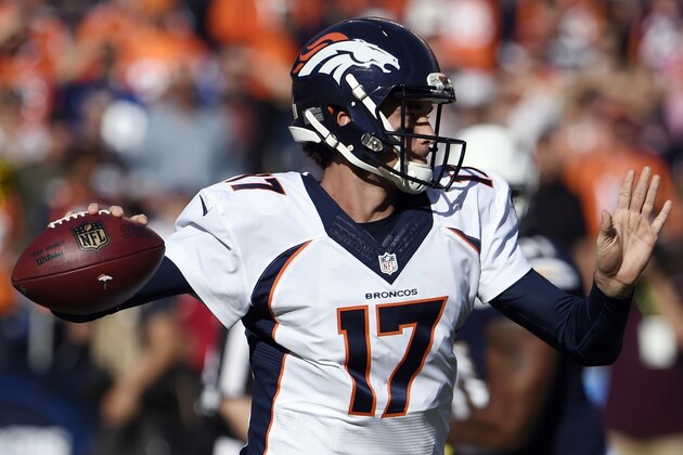 Denver Broncos quarterback Brock Osweiler passes against the San Diego Chargers during the first half in an NFL football game Sunday, Dec. 6, 2015, in San Diego. (AP Photo/Denis Poroy)