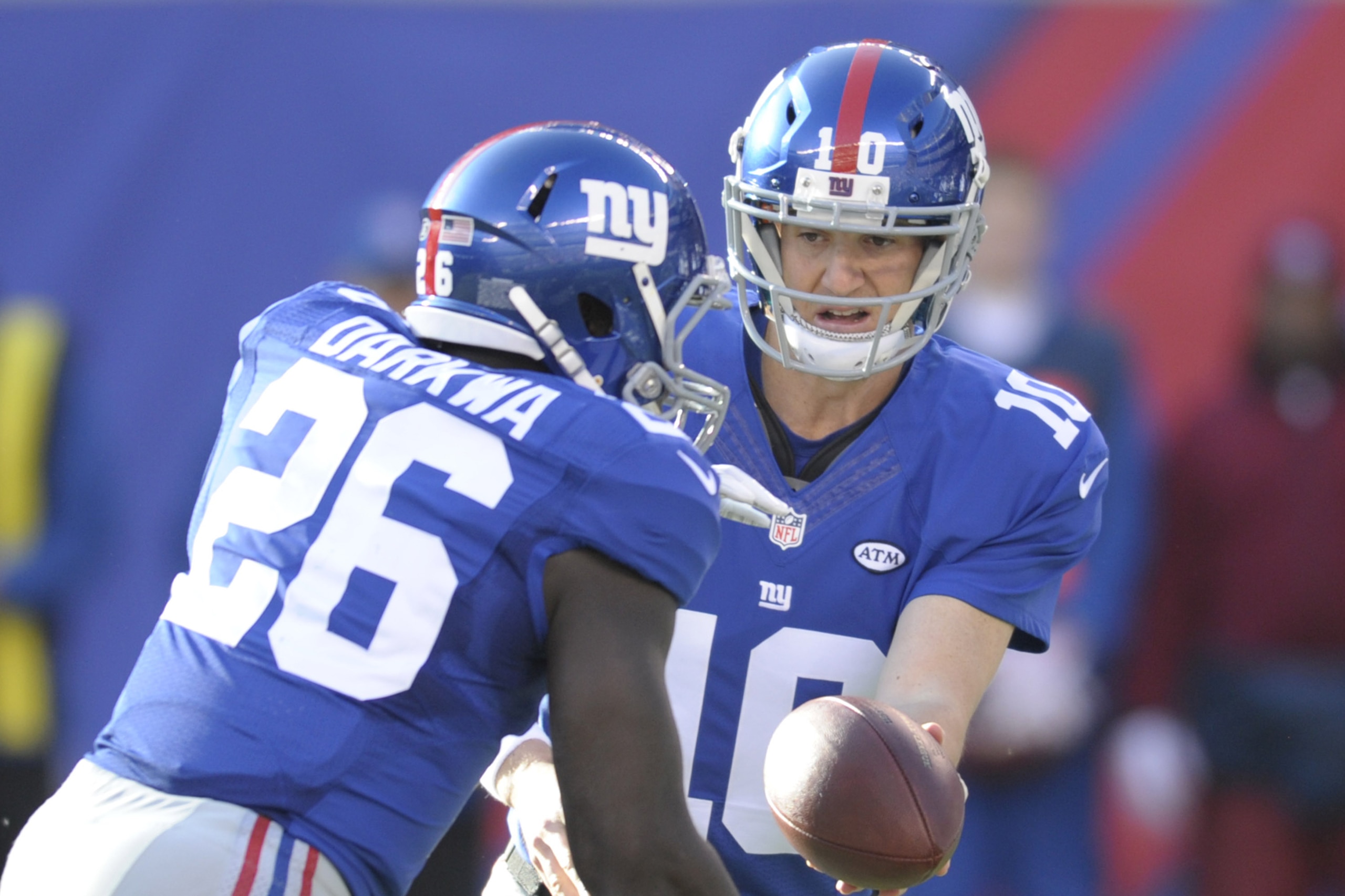 New York Giants quarterback Eli Manning, right, hands the ball off to running back Orleans Darkwa during the first half of an NFL football game against the New York Jets Sunday, Dec. 6, 2015, in East Rutherford, N.J. (AP Photo/Bill Kostroun) New York Giants quarterback Eli Manning, right, hands the ball off to running back Orleans Darkwa during the first half of an NFL football game against the New York Jets Sunday, Dec. 6, 2015, in East Rutherford, N.J. (AP Photo/Bill Kostroun)